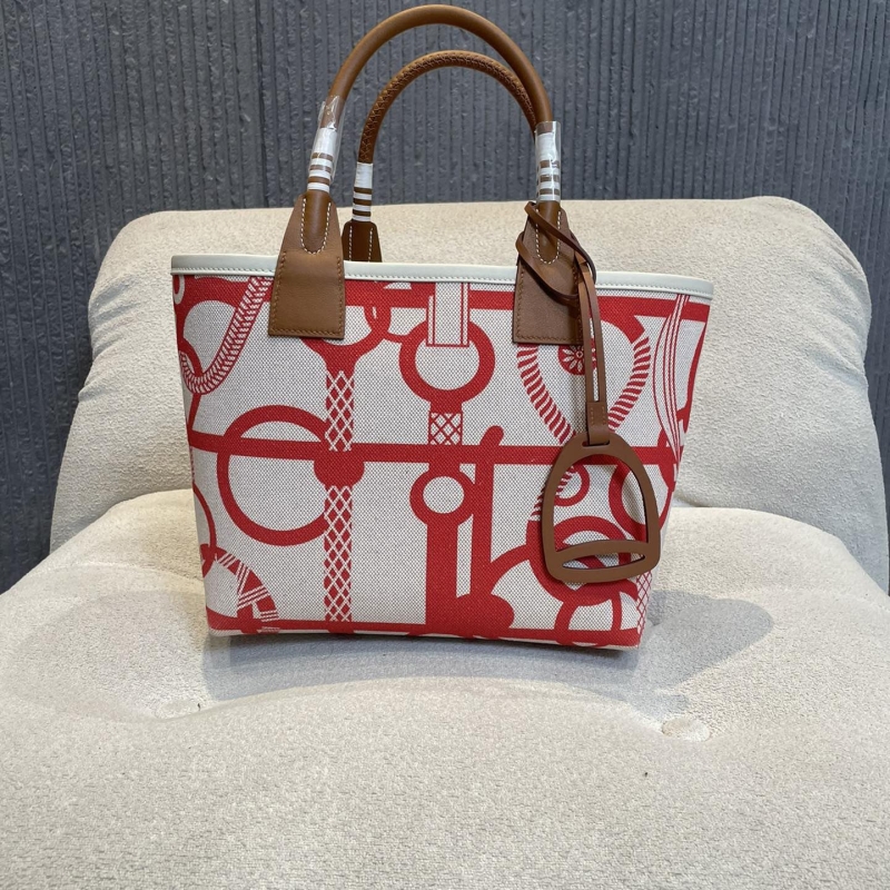 H**mes shopping bags